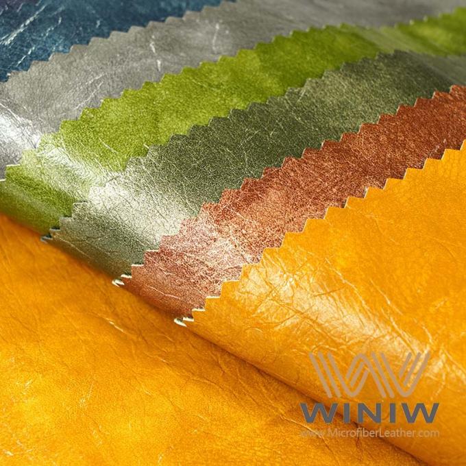 Indennità di WINIW e bello cuoio del Faux di alta qualità di struttura per gli indumenti